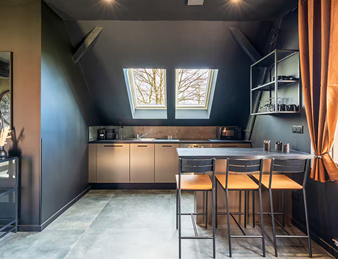 Espace salon et cuisine gîte Jungle Noire